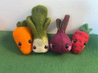 Needle felted wool leek with green layers and white base