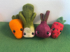 Needle felted wool leek with green layers and white base