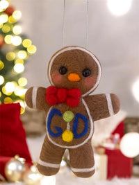 Close-up detail of needle felted gingerbread cookie ornament