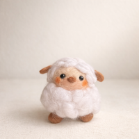 Needle felted little lamb figurine with soft white wool coat